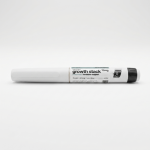 Close-up of a white peptide pen lying on a light surface, showing printed text like 'growth stack' and '12mg'.